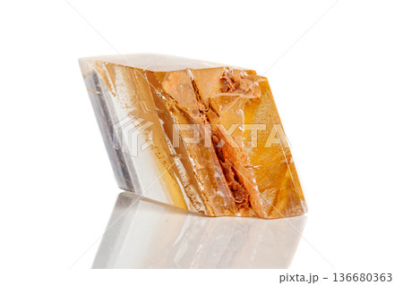 Macro mineral stone Calcite on a white background 136680363