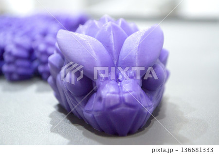 Art form printed on 3D printer from plastic. Art shape made using 3D printing from filament. Additive manufacturing. Layer-by-layer application of material. 3D printing technologies. FDM technology 136681333