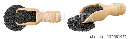 Nigella sativa or Black cumin in wooden scoop isolated on white background. Top view. Flat lay 136681471