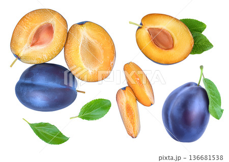 fresh blue plum and half with leaves isolated on white background with copy space for your text. Top view. Flat lay fresh blue plum and half with leaves isolated on white background with copy space for your text. Top view. Flat lay 136681538