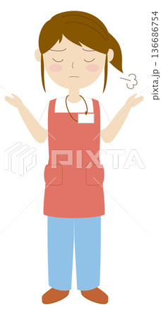 ため息をついているエプロンをつけた女性 ため息をついているエプロンをつけた女性 136686754