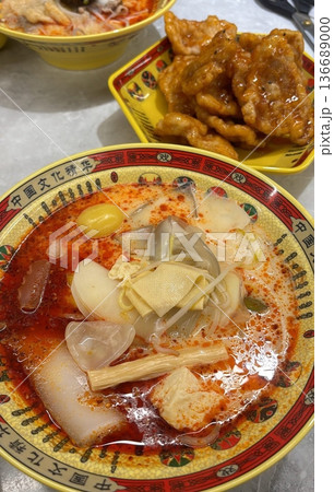 Spicy and numbing malatang with a mix of fresh ingredients in rich Sichuan broth, paired with crispy and tangy guobaorou. A perfect balance of bold heat and sweet-sour crunch for a Chinese feast. 136689000