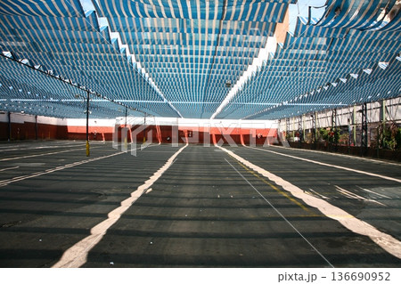 Roof protecting from the sun in an outdoor parking lot in Buenos Aires Argentina 136690952