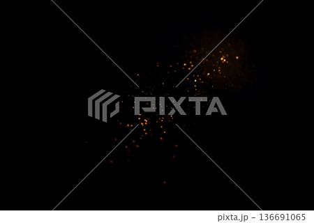 Golden abstract bokeh on black background. 136691065