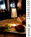 rib barbecue and lamp in dark restaurant room 136691300