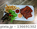 set of barbecue rib on table in restaurant 136691302