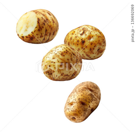 Fresh raw potatoes with skin, scattered and isolated on white background, concept of organic food ingredients Fresh raw potatoes with skin, scattered and isolated on white background, concept of organic food ingredients 136692069