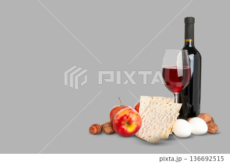 Wine, matzah, apples, eggs, and nuts set for Passover meal Wine, matzah, apples, eggs, and nuts set for Passover meal 136692515