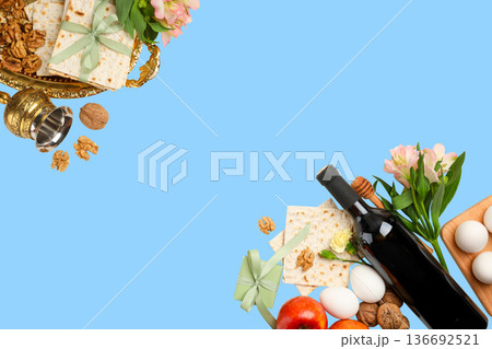 Passover table with matzah, wine, fruits, and flowers displayed Passover table with matzah, wine, fruits, and flowers displayed 136692521