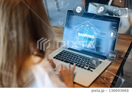 User makes a banking transaction using a laptop with online payment options displayed User makes a banking transaction using a laptop with online payment options displayed 136693668