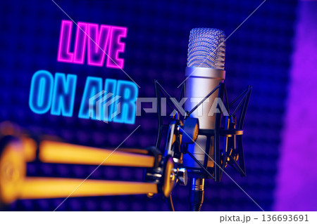 Podcast setup with a microphone and live on air sign in a recording space Podcast setup with a microphone and live on air sign in a recording space 136693691