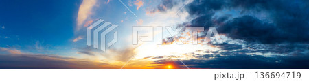 Natural background of the colorful panorama sky. Beautiful cloud in the sunrise sky background. Sky banners background. 136694719