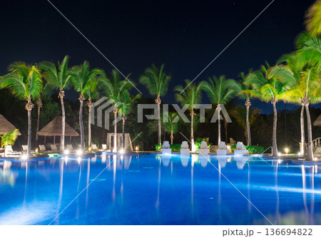 Swimming pool at a luxury Caribbean, tropical resort at night 136694822