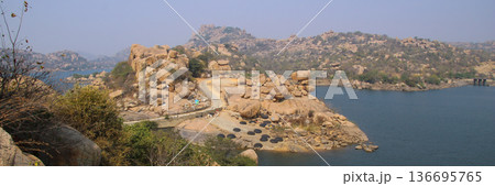 Sanapur Reservoir, ertificial lake and granite mountains, Karnataka, India. 136695765