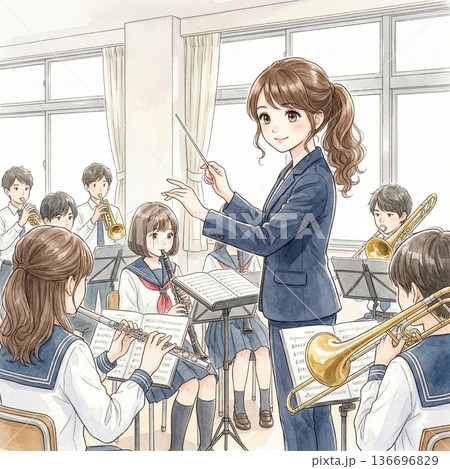 吹奏楽の指揮をする若い顧問の女性教師 吹奏楽の指揮をする若い顧問の女性教師 136696829