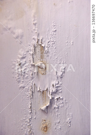 Severe water damage and mold growth on a bathroom ceiling and wall Severe water damage and mold growth on a bathroom ceiling and wall 136697470