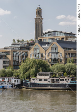 This Brentford riverside development a refined mix of history and modern living. the area dedicated to public piazzas and walkways. 136697664