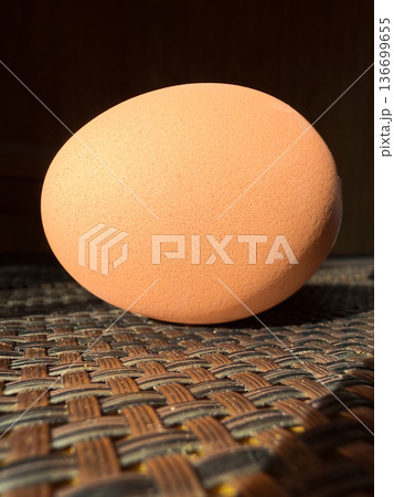 Single fresh brown chicken egg Single fresh brown chicken egg 136699655