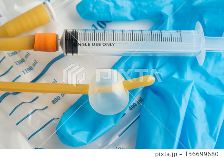 Foley catheter and urine drainage bag collect urine for disability or patient in hospital. Foley catheter and urine drainage bag collect urine for disability or patient in hospital. 136699680