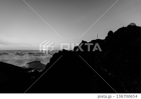Black and white silhouette from Miradouro do Pico do Arieiro, Madeira, sunrise outlines ridges Black and white silhouette from Miradouro do Pico do Arieiro, Madeira, sunrise outlines ridges 136700654
