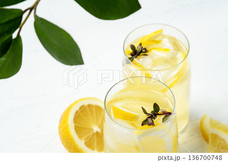 Homemade lemonade with lemon on a white background 136700748