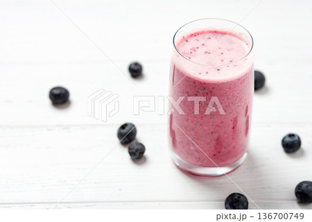 Two glasses of berry smoothie with chia and fresh berries 136700749