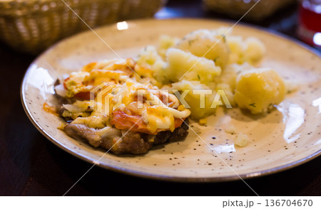 French meat with boiled potatoes served on plate French meat with boiled potatoes served on plate 136704670