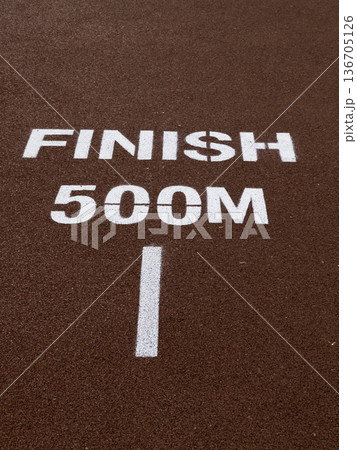 Athlete running track forward as motivation and inspiration 136705126