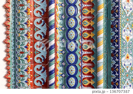 Ornate colorful ceramic tiles form a floral patterns 136707387