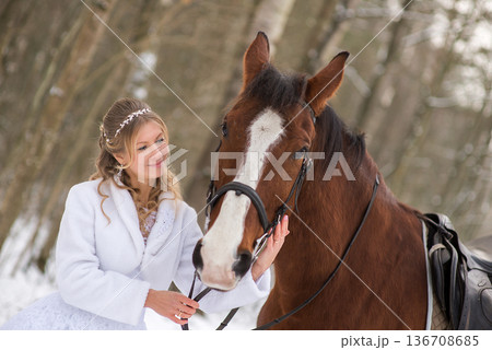 Tender Winter Bride And Horse Portrait 136708685