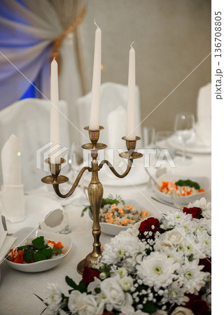 Elegant Wedding Candles And Floral Table Decoration 136708805