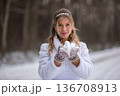 Winter Bride Holding Snow In Gentle Hands 136708913