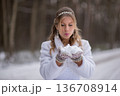 Bride Preparing To Blow Snow Playfully 136708914