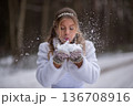 Snowflakes Exploding From Bride Hands 136708916