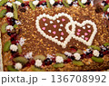 Decorative Wedding Cake Detail With Hearts And Fruit Topping 136708992