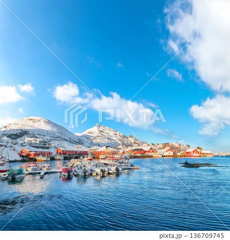Captivating snowy morning  cityscape of Sorvagen town and port. 136709745