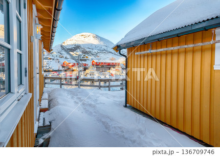Captivating snowy morning  cityscape of Sorvagen town and port. 136709746