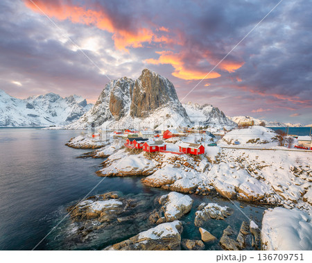 Captivating sunset winter view on Hamnoy village and Festhaeltinden mountain 136709751