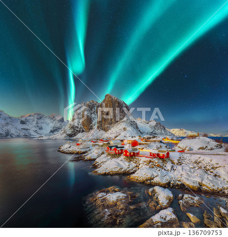 Breathtaking winter view on Hamnoy village at night with Northern lights (Aurora Borealis). 136709753