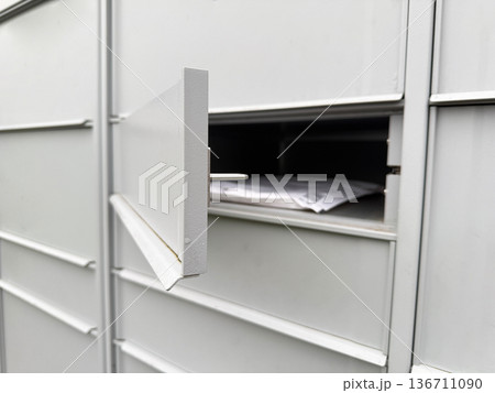 Modern mailbox system receiving online shopping parcel. Modern mailbox system receiving online shopping parcel. 136711090