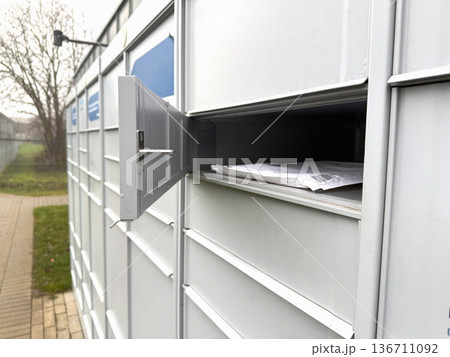 Modern mailbox system receiving online shopping parcel. Modern mailbox system receiving online shopping parcel. 136711092