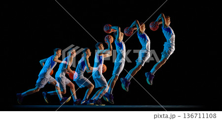Basketball player jump shot progression in stroboscopic light. Basketball player jump shot progression in stroboscopic light. 136711108