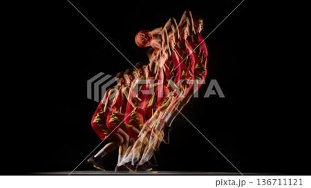 Basketball player jumping for dunk stroboscopic sequence. 136711121