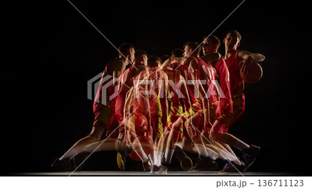 Basketball player turning with ball stroboscopic effect. 136711123