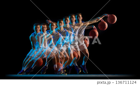 Basketball player wide arm pass in stroboscopic motion. 136711124