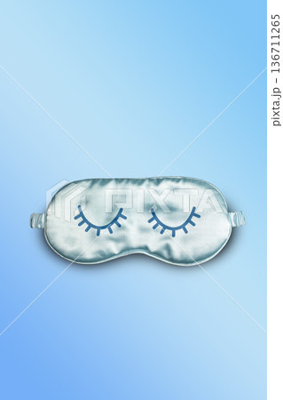 World Sleep day, Sleeping mask on light background with copy space. Vertical 136711265