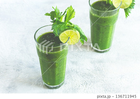two glasses, with green smoothie, celery and spinach, apple and kiwi, cucumber, vegetable smoothie, breakfast, homemade, no people, two glasses, with green smoothie, celery and spinach, apple and kiwi, cucumber, vegetable smoothie, breakfast, homemade, no people, 136711945