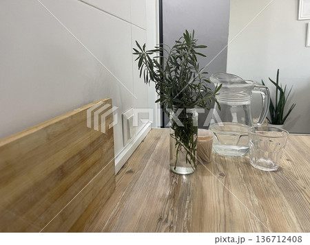 transparent dishes on the kitchen table 136712408