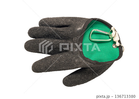 rubber fishing glove on a white isolated rubber fishing glove on a white isolated 136713380