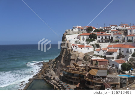 Traditional white village of Azenhas do Mar perched on a cliff, Portugal. 136713495